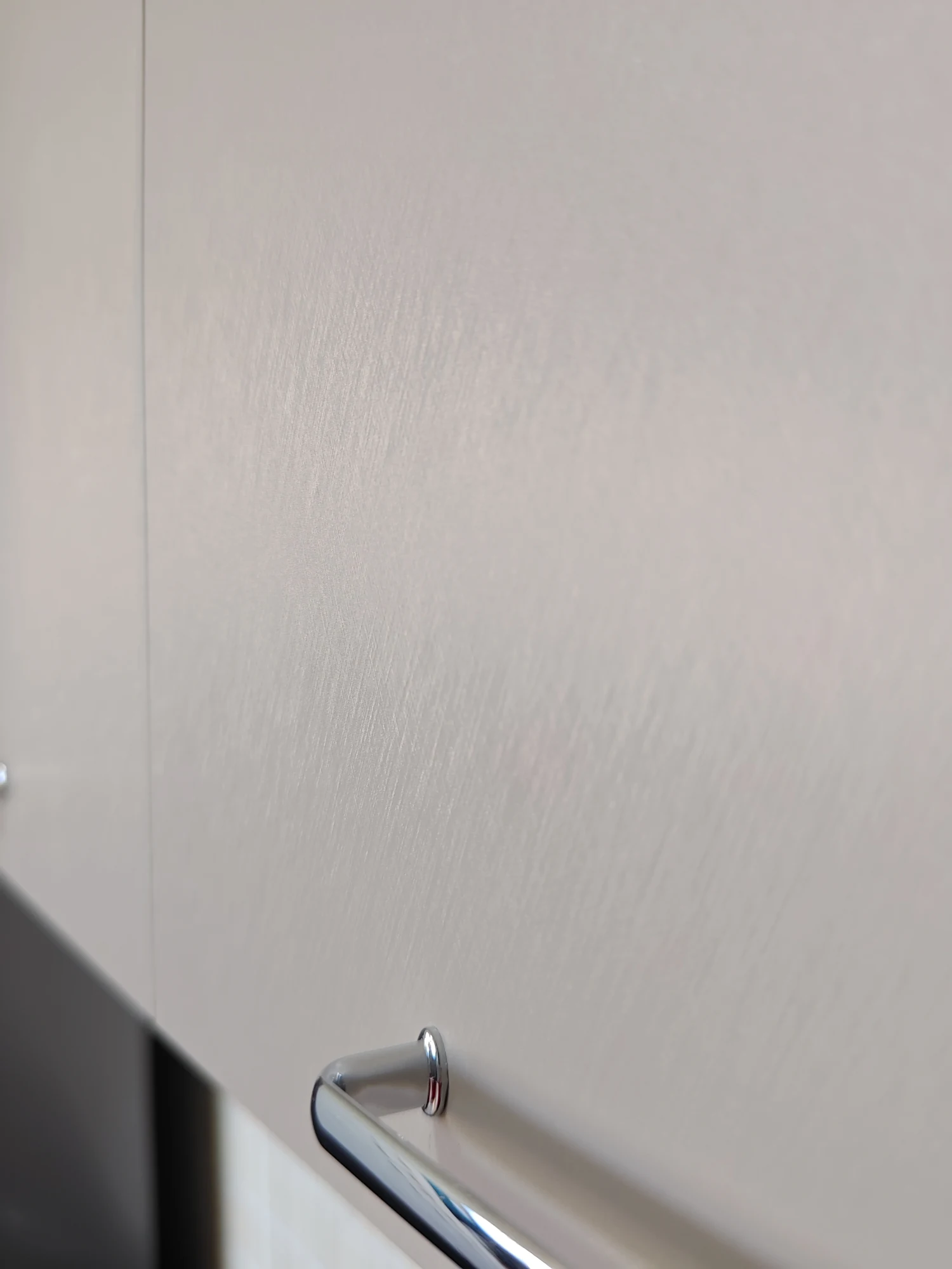 Textura frontului deschis la culoare și mânerul nou
